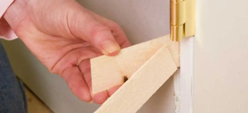Shim, Level, and Plumb the Door